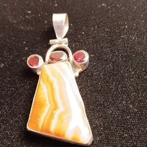 Elegant Silver Necklace with Yellow and Red Stones